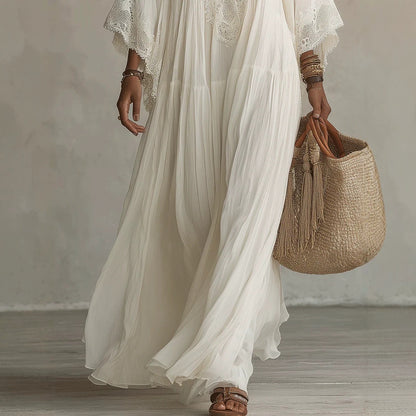 Vestido largo de blanco con escote en V