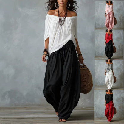 Conjunto blusa blanca hombros descubiertos y pantal�n palazzo negro