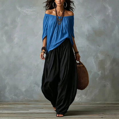 Conjunto blusa blanca hombros descubiertos y pantal�n palazzo negro