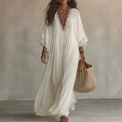 Vestido largo de blanco con escote en V