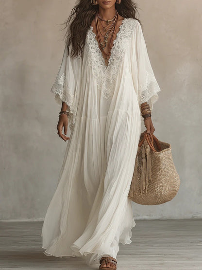 Vestido largo de blanco con escote en V